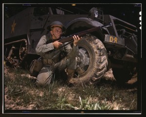 GI in WWI helmet with M1 Garand