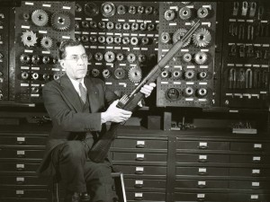 John Garand loading a clip into his rifle