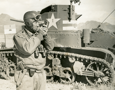 Patton shoots an azimuth during California desert maneuvers