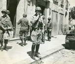Patton smoking a cigar in Gela, Sicily