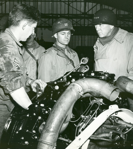 Patton observing engine maintenance in the Third Army