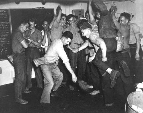 Sailors dance aboard the Bougainville