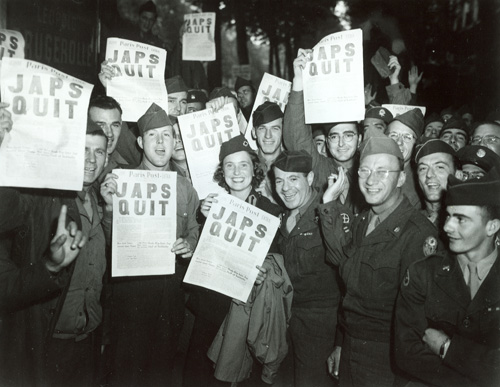 Americans at the Rainbow Corner Red Cross Club in Paris celebrate