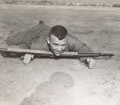 Gi crawling with rifle
